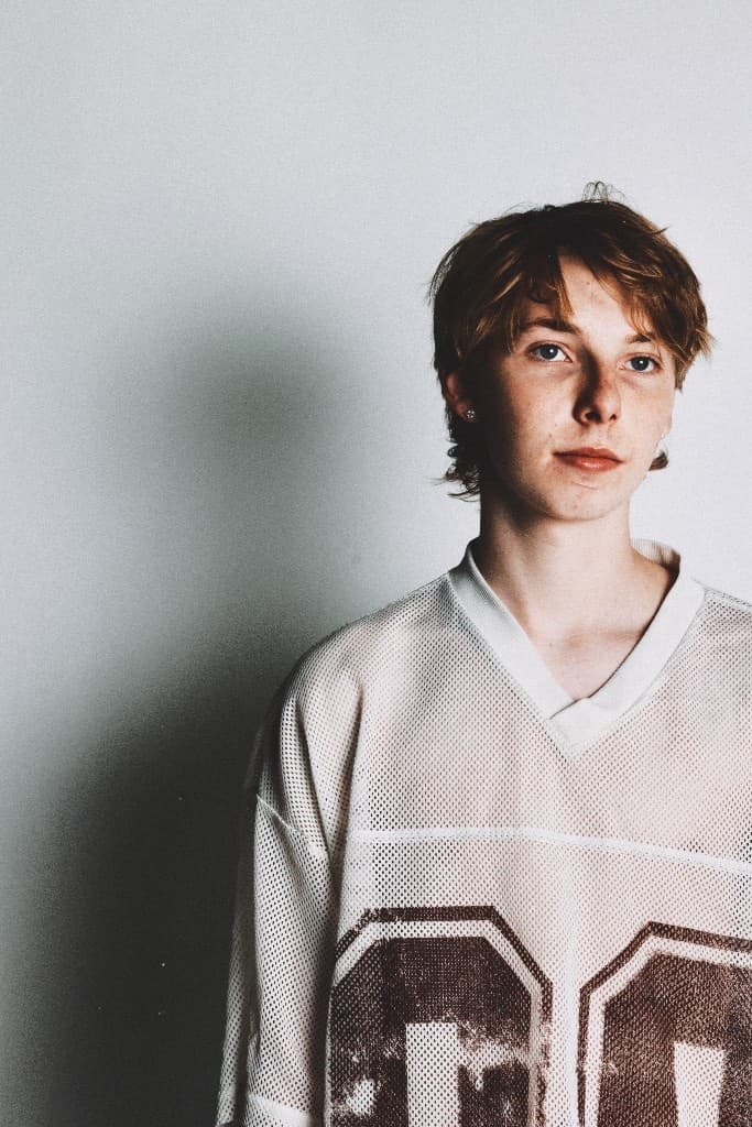 Portrait in a vintage mesh football jersey